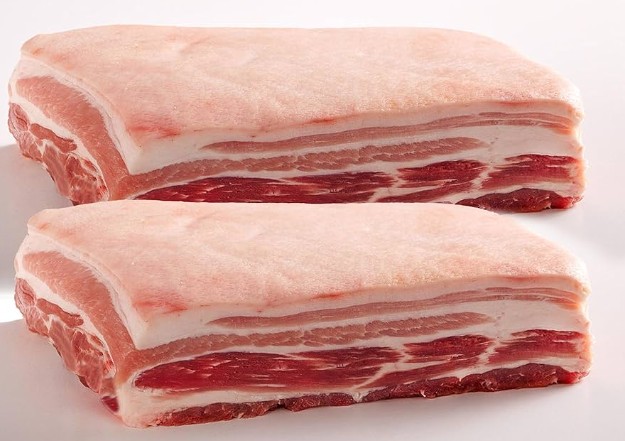 Fresh skin-on pork belly slab